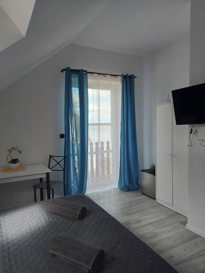 Pokoje I Apartamenty Matdar Mikołajki Quarto foto